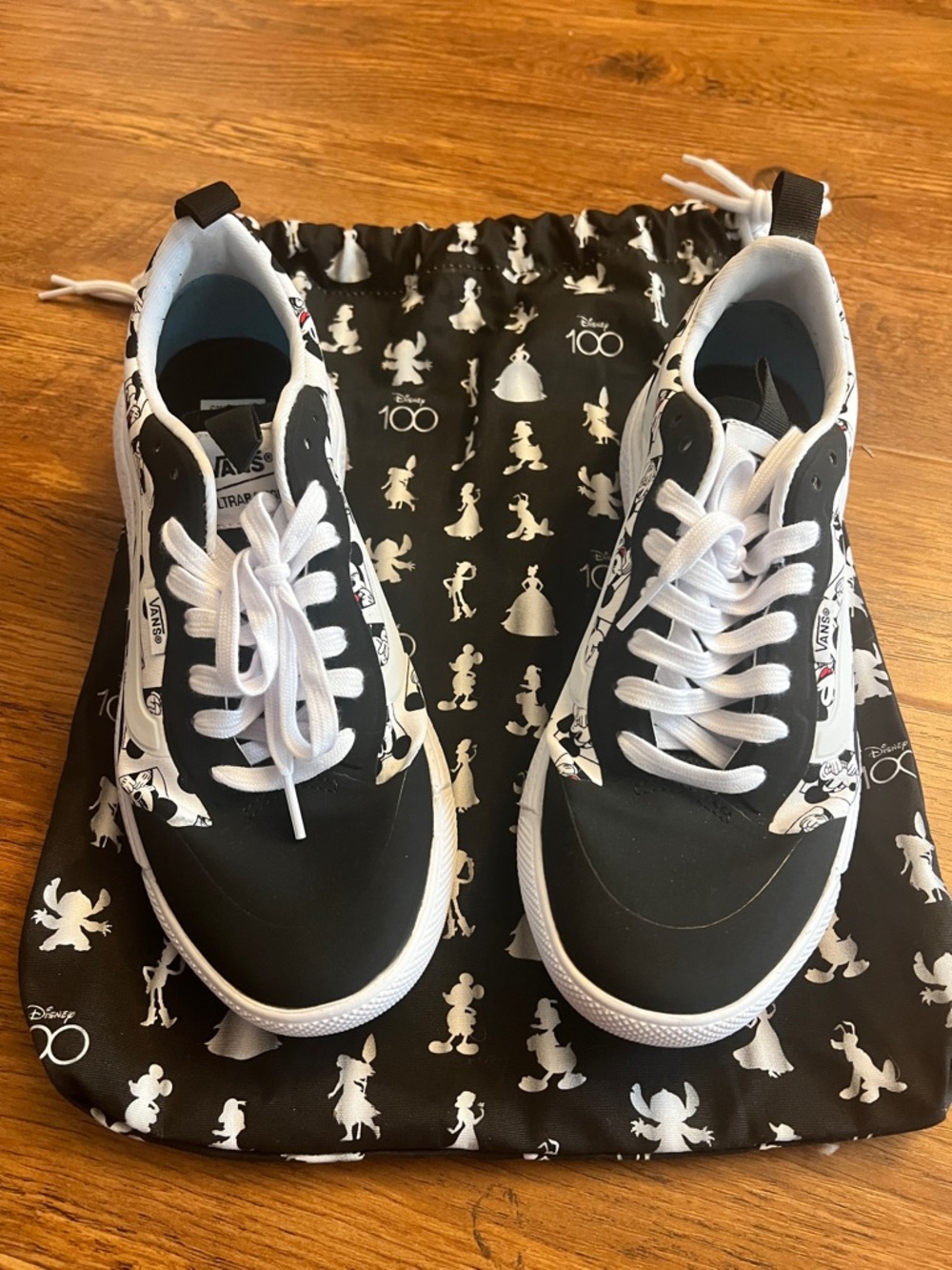 Vans Black and White Disney Graphic Athletic Shoes